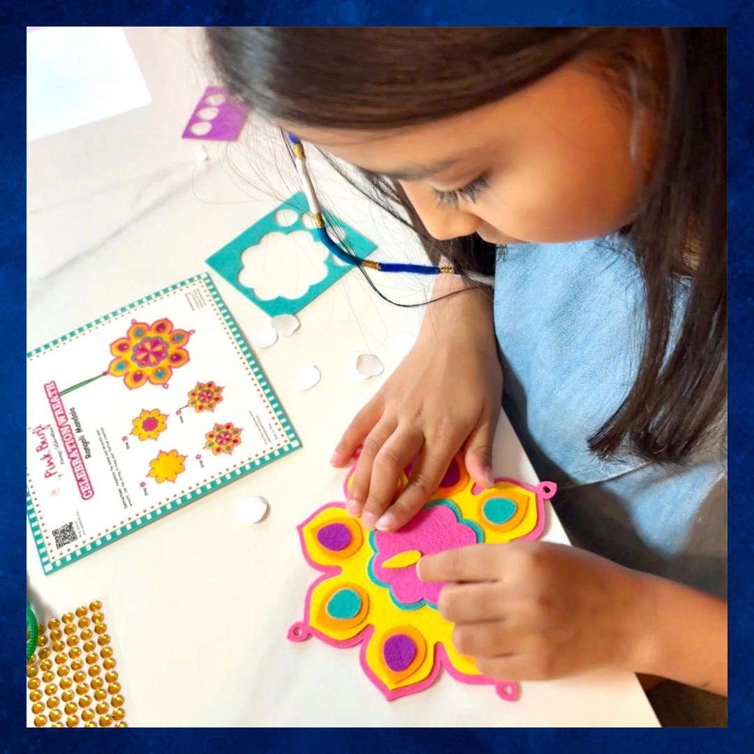 Child making the colorful felt Pink Burfi Rangoli Mandala Celebration Wreath craft